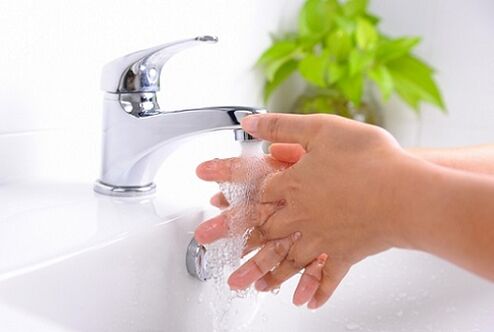 lavado de mans para evitar a infección parasitaria